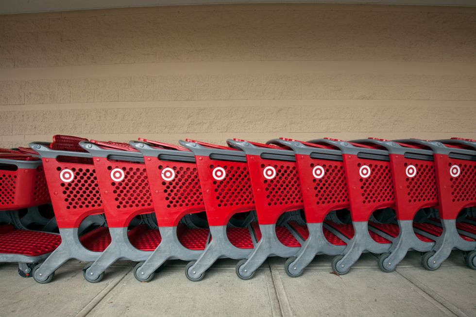 view-of-branded-shopping-carts-lined-up-on-a-sidewalk-news-photo-1605802464.jpg