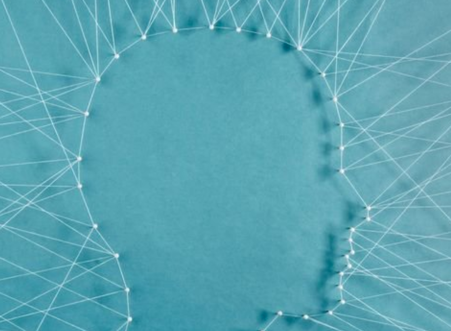 threads forming the shape of a human head
