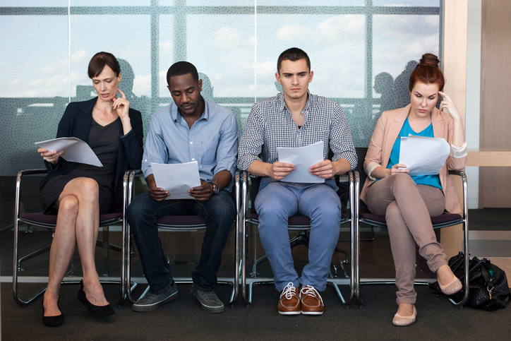 candidates sitting in a row, interview prepping