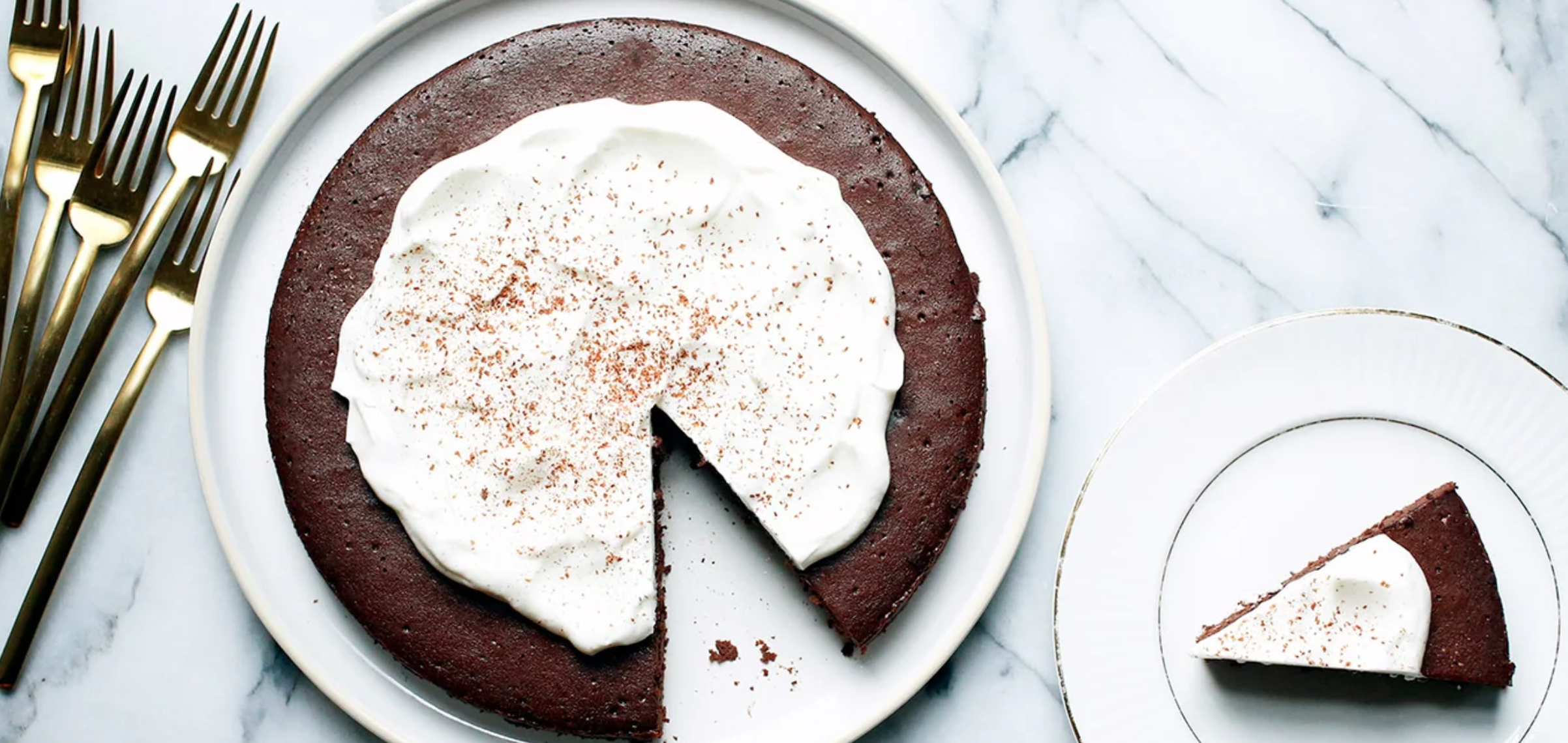 chocolate cake with white cream on top