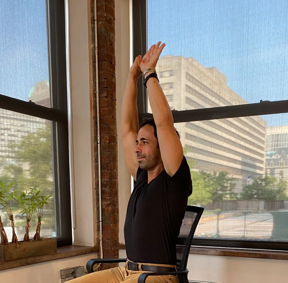 person exercising while seated