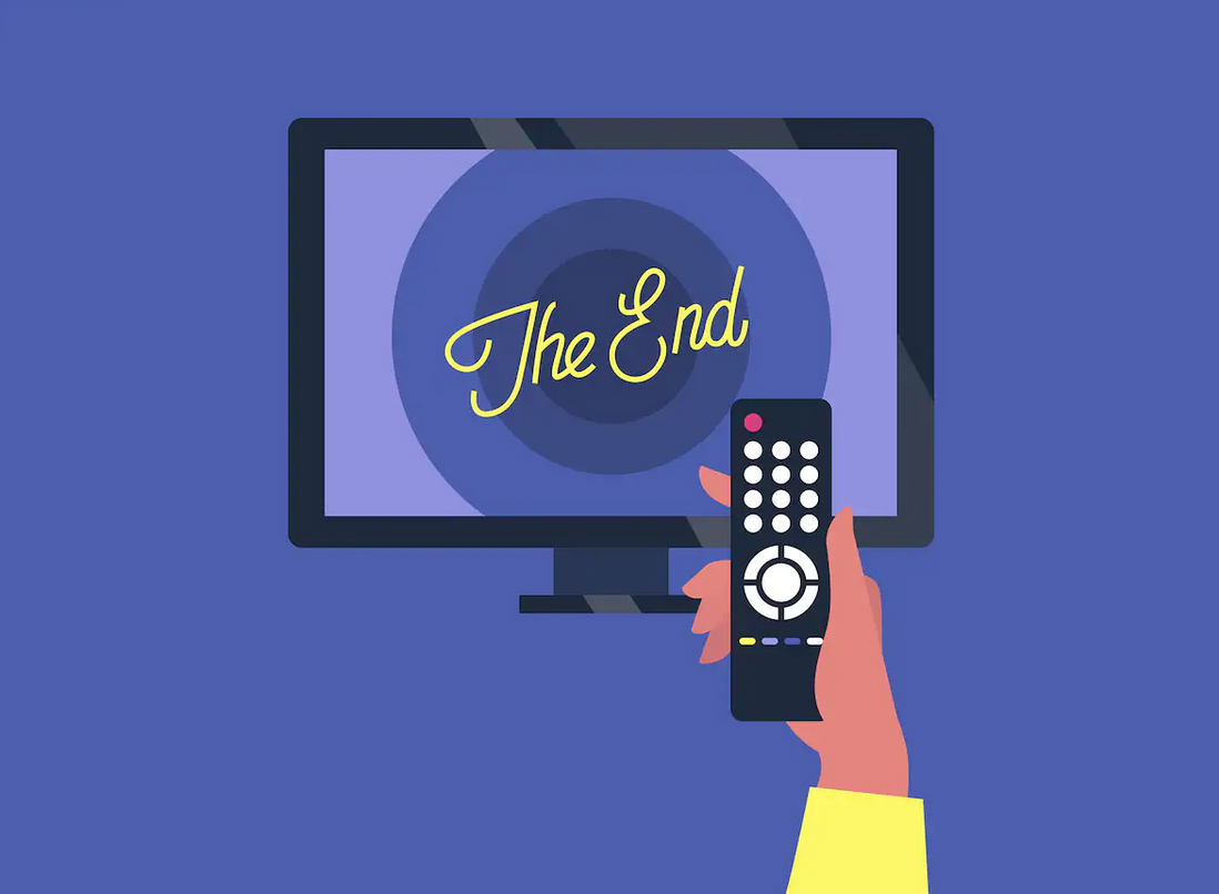 a hand holding a remote, 'the end' on the tv