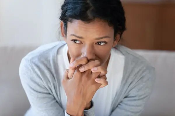 woman looking worried