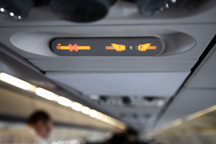 no smoking and seatbelt sign in airplane